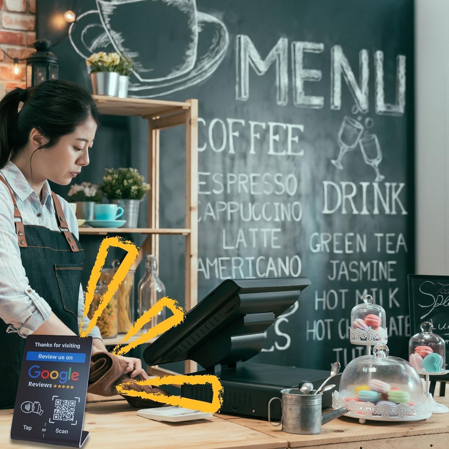 Barista at coffee shop register.